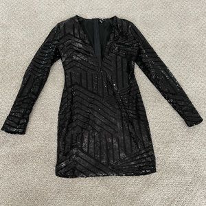 Long sleeve black sequin dress with plunging neckline